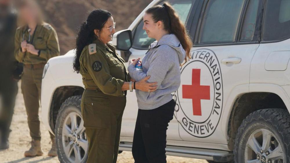 Agam Berger being transferred into the hands of the Israel Defense Forces. Photo Credit: IDF.