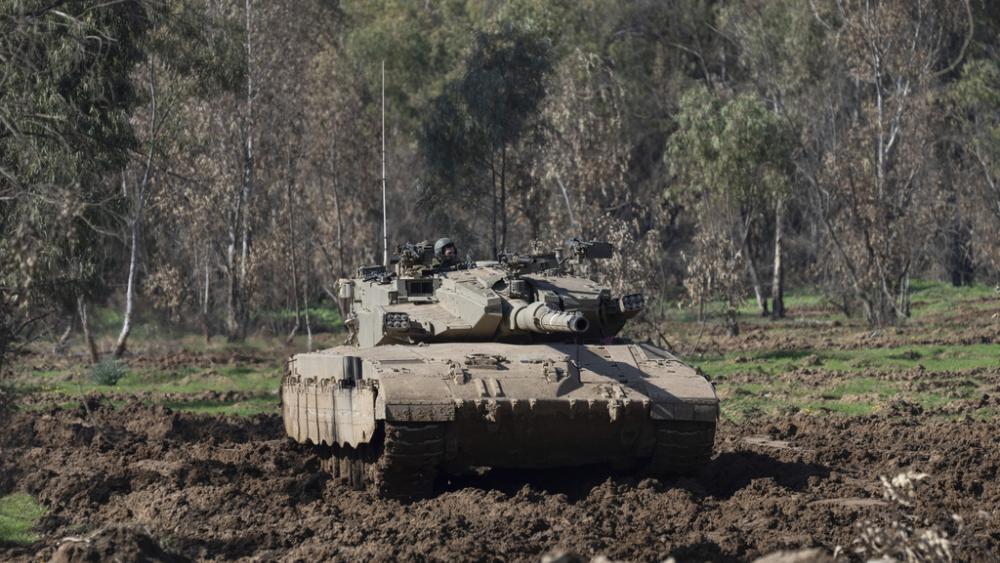 Israeli army tank moves near the Israeli-Gaza border, in southern Israel, Thursday, Jan. 18, 2024. The army is battling Palestinian militants across Gaza in the war ignited by Hamas&#039; Oct. 7 attack on Israel. (AP Photo/Ohad Zwigenberg)