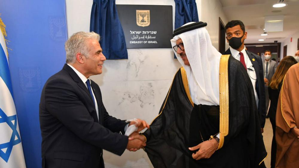 Foreign Minister Yair Lapid and Bahrain’s Foreign Minister Abdullatif al Zayani Open Israel’s Embassy in Manama. Photo Credit: Shlomi Amshalem, GPO.