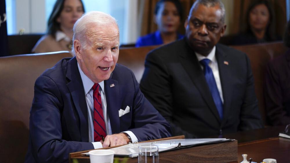 President Joe Biden speaks during a cabinet meeting at the White House, Thursday, Jan. 5, 2023, in Washington. Secretary of Defense Lloyd Austin listens at right. (AP Photo/Patrick Semansky)