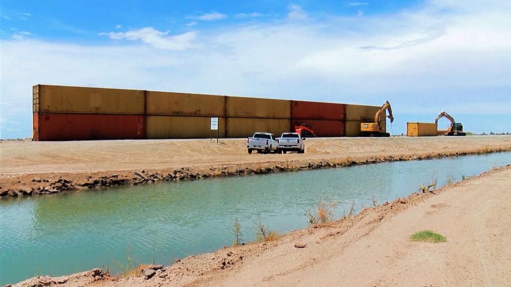 Shipping containers are being used in Arizona and Texas to plug gaps in the border fence.