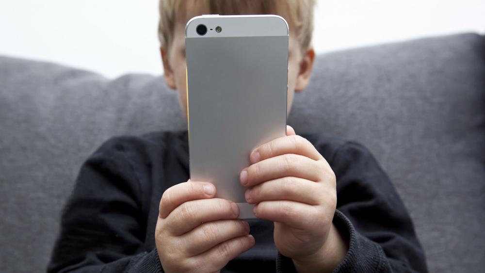 Kid using a CellPhone