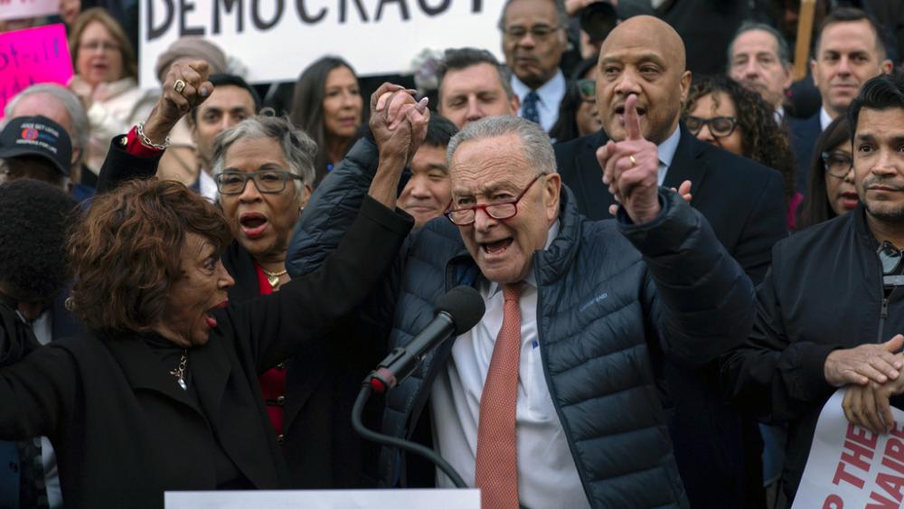 Senate Minority Leader Chuck Schumer, D-NY, and Rep. Maxine Waters, D-CA, lead a rally against Elon Musk outside the Treasury Department in Washington, Feb. 4, 2025. (AP Photo/Jose Luis Magana)