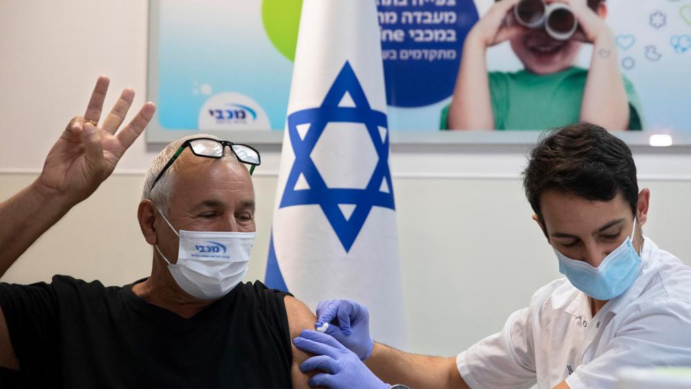 Israel begins campaign to give 3rd vaccination shot. Photo: AP