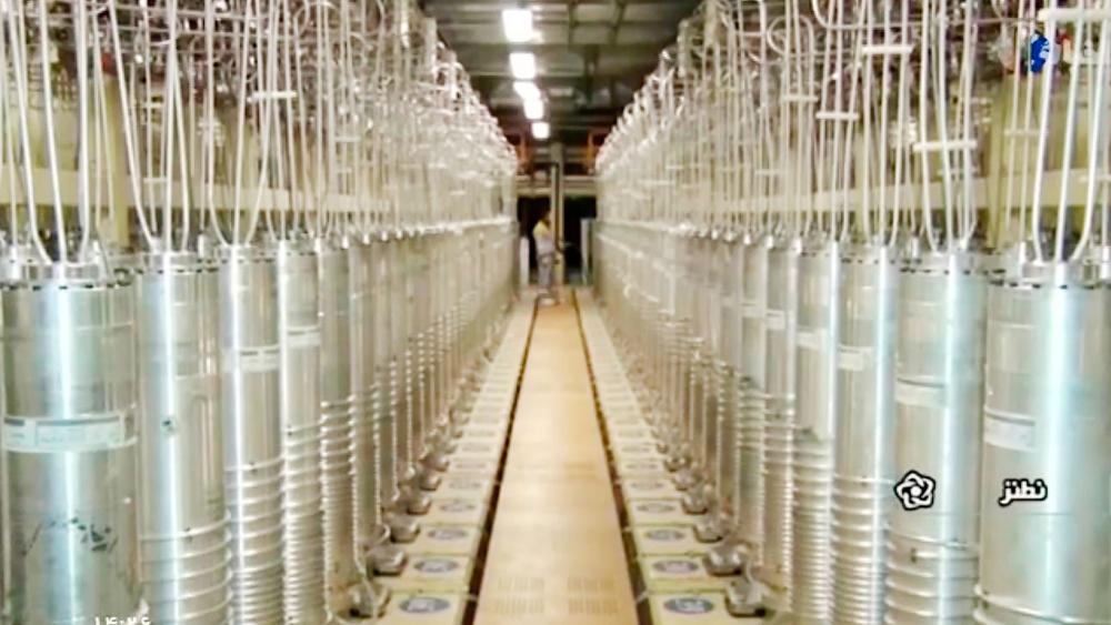 In this image made from April 17, 2021, video released by Iranian state-run TV shows various centrifuge machines line the hall at the Natanz Uranium Enrichment Facility.