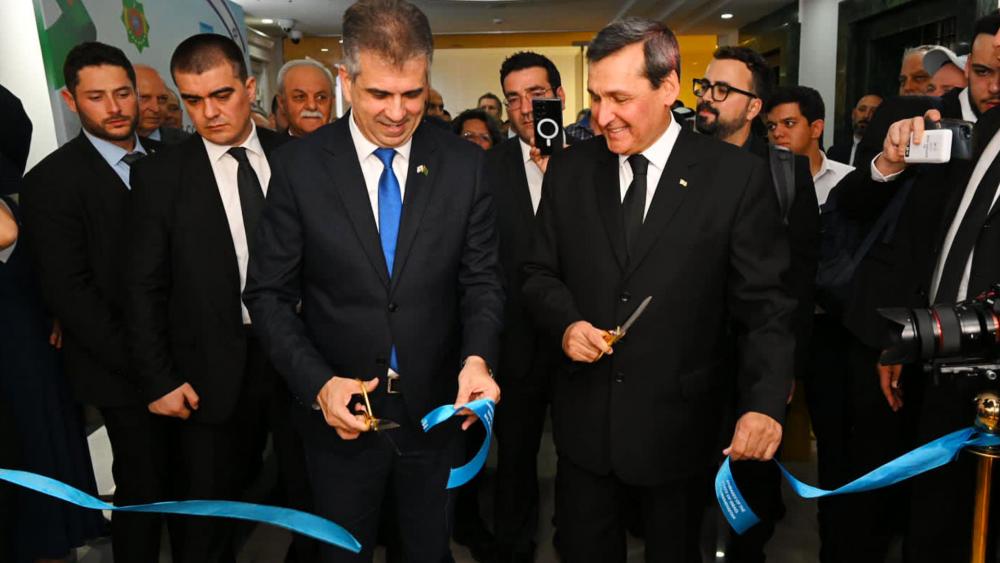 Israel&#039;s Foreign Minister Eli Cohen joins Turkmen Foreign Minister Rasit Meredow in a ribbon-cutting ceremony to open Israel&#039;s new embassy in Turkmenistan April 20,2023. Photo Credit: Shlomi Amsellam.