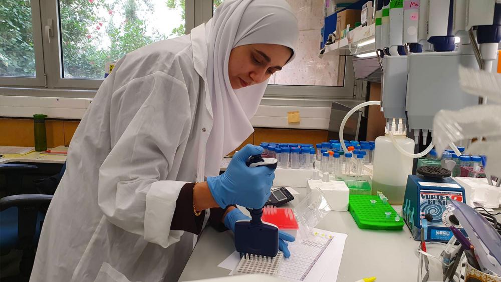  Dr. Shakira at the lab preparing samples for DNA sequencing. Photo credit: Hebrew University