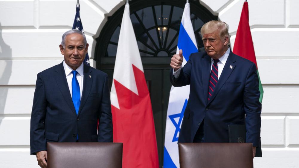 Israeli Prime Minister Benjamin Netanyahu, left, and President Donald Trump stand to depart the Abraham Accords signing ceremony on the South Lawn of the White House, Tuesday, Sept. 15, 2020, in Washington. (AP Photo/Alex Brandon)