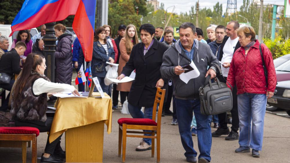 People line up to vote in a referendum in Luhansk, Luhansk People&#039;s Republic controlled by Russia-backed separatists, eastern Ukraine, Sept. 24, 2022. 