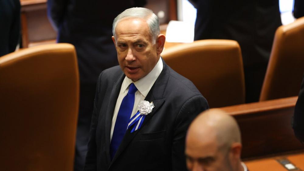 Israel&#039;s Likud Party leader Benjamin Netanyahu arrives during the swearing-in ceremony for Israeli lawmakers at the Knesset, Israel&#039;s parliament, in Jerusalem, Tuesday, Nov. 15, 2022. (Abir Sultan/Pool Photo via AP)