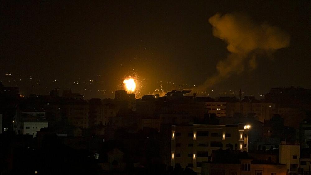 Fire and smoke rises following an Israeli airstrike in central Gaza Strip, Friday, Jan. 27, 2023. (AP Photo/Fatima Shbair)