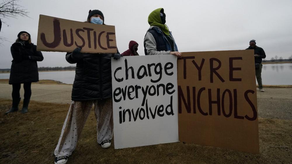 A group of demonstrators gather at dusk in Shelby Farms Park on Monday, Jan. 30, 2023, in Memphis, Tenn., in response to the death of Tyre Nichols, who died after being beaten by Memphis police officers. (AP Photo/Gerald Herbert)