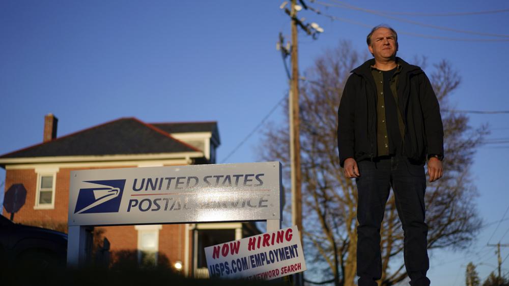 Gerald Groff, a former postal worker whose case will be argued before the Supreme Court, stands during a television interview near the United State Postal Service, Wednesday, March 8, 2023, in Quarryville, Pa.  (AP Photo/Carolyn Kaster)