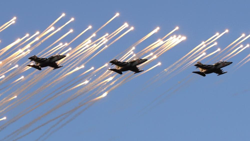 Belarusian army Su-25 jet fighters fly during a parade marking Independence Day in Minsk, Belarus, Wednesday, July 3, 2019. (AP Photo/Sergei Grits, File)