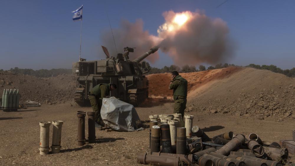 An Israeli mobile artillery unit fires a shell from southern Israel towards the Gaza Strip, in a position near the Israel-Gaza border, Nov. 6, 2023. (AP Photo/Ohad Zwigenberg, File)