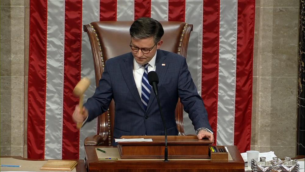 This image from House Television shows House Speaker Mike Johnson of La., banging the gavel after he announced the House voted to impeach Homeland Security Secretary Alejandro Mayorkas, Feb. 13, 2024. (House Television via AP)