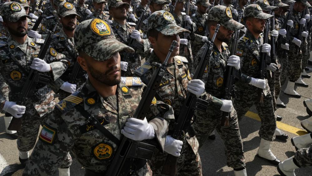 Iranian army members march during Army Day parade at a military base in northern Tehran, Iran, Wednesday, April 17, 2024. (AP Photo/Vahid Salemi)