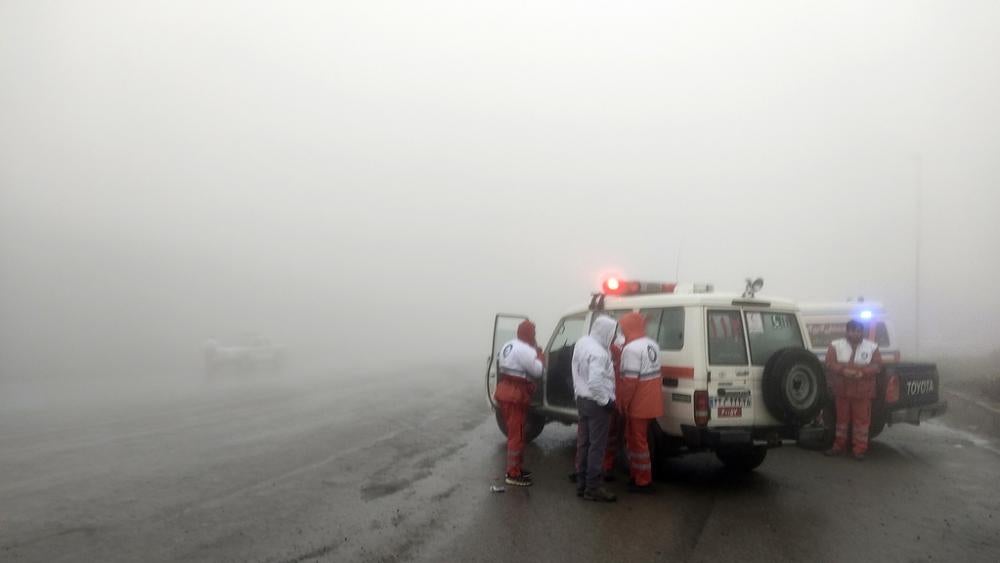 In this photo provided by Moj News Agency, rescue teams are seen near the site of the incident of the helicopter carrying Iranian President Ebrahim Raisi in Varzaghan in northwestern Iran, Sunday, May 19, 2024. (Azin Haghighi, Moj News Agency via AP)