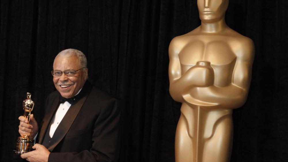 James Earl Jones poses with his honorary Oscar at the 84th Academy Awards on Sunday, Feb. 26, 2012, in the Hollywood section of Los Angeles. Jones died at age 93, Monday, Sept. 9, 2024. (AP Photo/Chris Carlson, File)