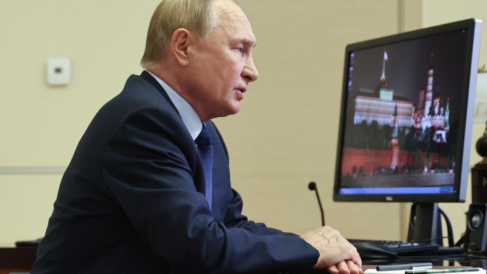 Russian President Vladimir Putin chairs a meeting with members of the Security Council via videoconference at the Novo-Ogaryovo state residence, outside Moscow, Russia, Friday, Sept. 13, 2024. (Alexander Kazakov, Sputnik, Kremlin Pool Photo via AP)