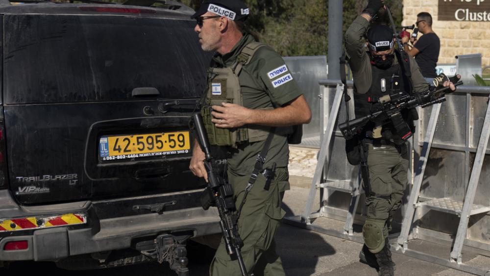 Israeli security forces secure a road near where Israel&#039;s government says a drone launched toward Israeli Prime Minister Benjamin Netanyahu&#039;s house in Caesarea, Israel Saturday, Oct. 19, 2024. (AP Photo/Ariel Schalit)