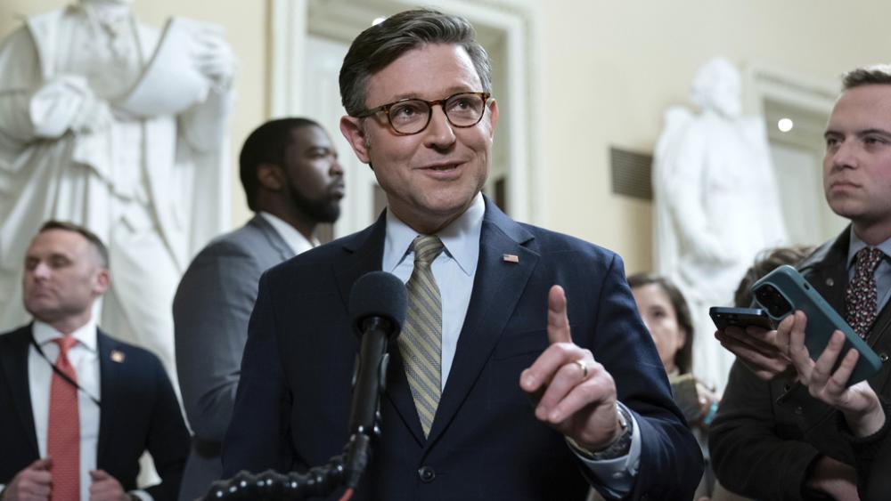 Speaker of the House Mike Johnson, R-La., talks to reporters after passing the funding bill to avert the government shutdown at the Capitol in Washington, Friday, Dec. 20, 2024. (AP Photo/Jose Luis Magana)