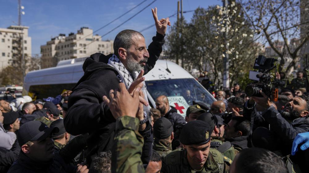A Palestinian prisoner is greeted after being released from Israeli prison following a ceasefire agreement between Israel and Hamas, in the West Bank city of Ramallah, Saturday, Feb. 15, 2025. (AP Photo/Nasser Nasser)