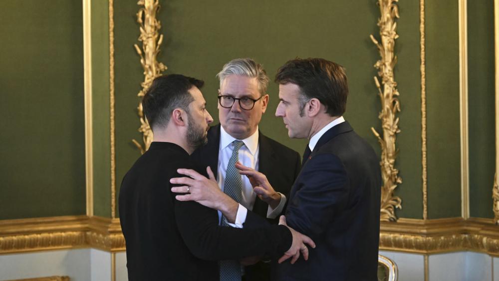 Ukraine&#039;s President Volodymyr Zelensky, Prime Minister Sir Keir Starmer and France&#039;s President Emmanuel Macron at a Leaders&#039; Summit on Ukraine in London, March 2, 2025. (Press Association via AP Images)