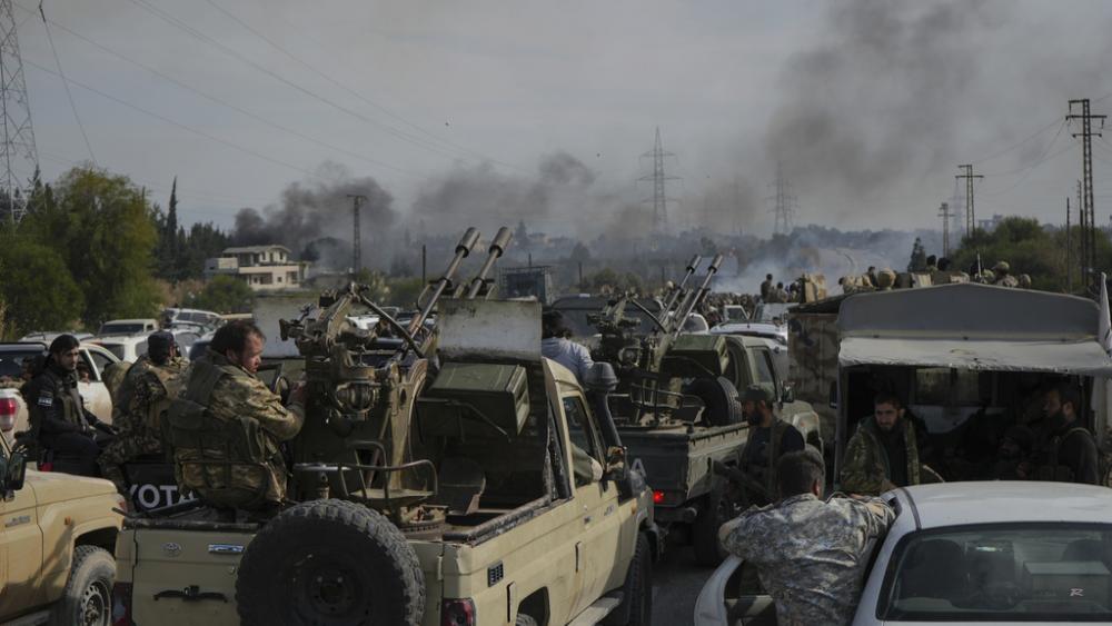Syrian army forces head to the villages of the Latakia countryside and the Syrian coast with heavy weapons to fight against the fighters linked to Syria&#039;s ousted leader Bashar al-Assad, March 7, 2025. (Photo: Moawia Atrash/picture-alliance/dpa/AP Images)