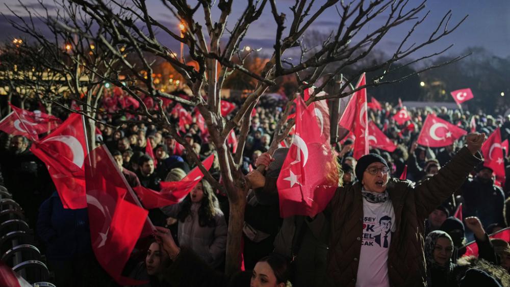 People gather outside the City Hall to protest the arrest of Istanbul Mayor Ekrem Imamoglu in Istanbul, Turkey, Wednesday, March 19, 2025. (AP Photo/Emrah Gurel)