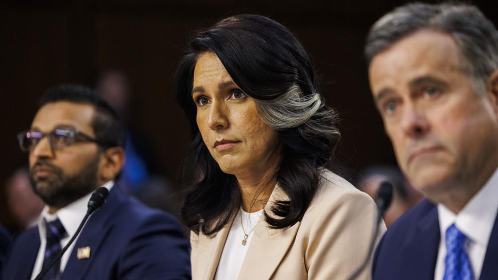 National Intelligence Director Tulsi Gabbard and CIA Director John Ratcliffe were in the Signal group chat that discussed war plans that inadvertently included the Editor-in-Chief of The Atlantic. (Photo by Aaron Schwartz/Sipa USA)(Sipa via AP Images)