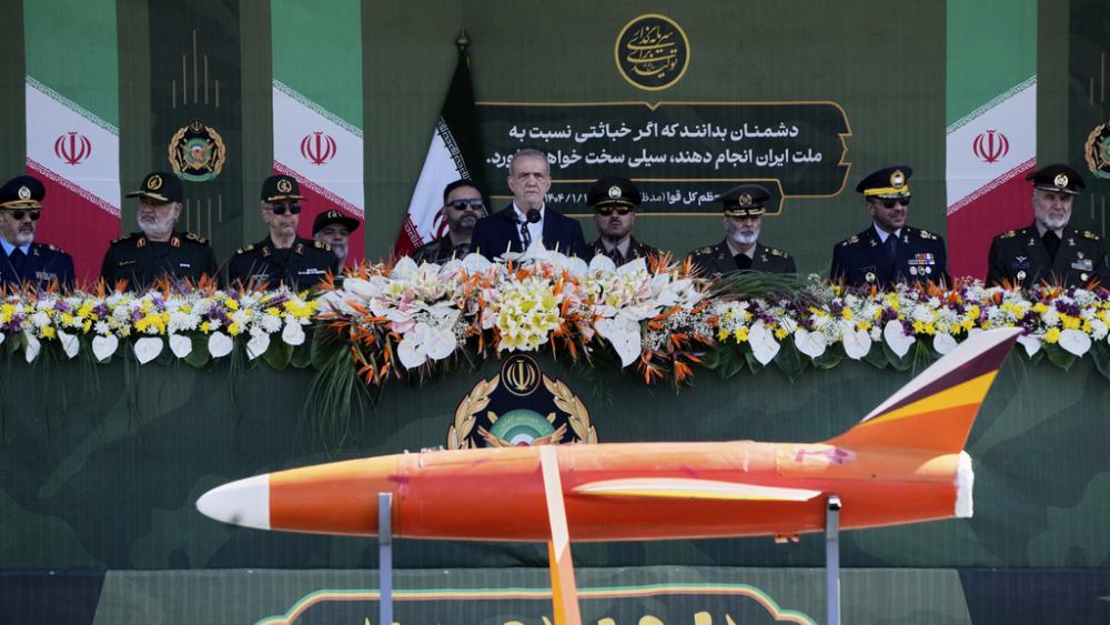 Iranian President Masoud Pezeshkian reviews the Iranian army&#039;s hardware during the parade commemorating National Army Day in front of the shrine of Ayatollah Khomeini,  just outside Tehran, Iran, Friday, April 18, 2025. (AP Photo/Vahid Salemi)