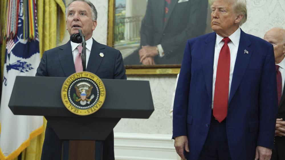 President Donald Trump, right, listens as White House special envoy Steve Witkoff, left, speaks on Wednesday, May 28, 2025, in the Oval Office of the White House in Washington. (AP Photo/Evan Vucci)