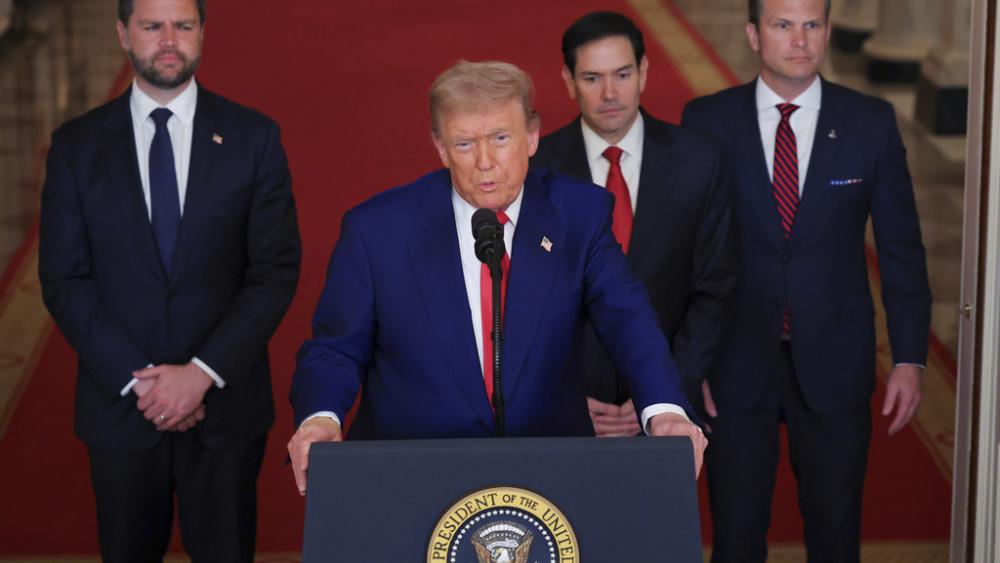 President Donald Trump speaks from the East Room of the White House in Washington, Saturday, June 21, 2025, as Vice President JD Vance, Secretary of State Marco Rubio and Defense Secretary Pete Hegseth listen. (Carlos Barria/Pool via AP)