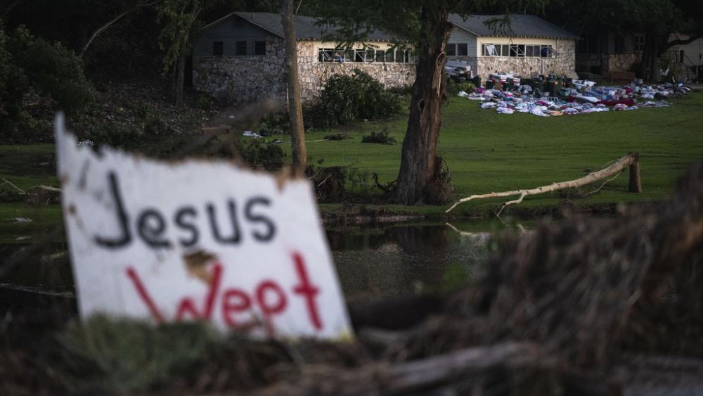 Campers belongings sit outside one of Camp Mystic&#039;s cabins near the Guadalupe River, Monday, July 7, 2025, in Hunt, Texas, after a flash flood swept through the area. (AP Photo/Eli Hartman)