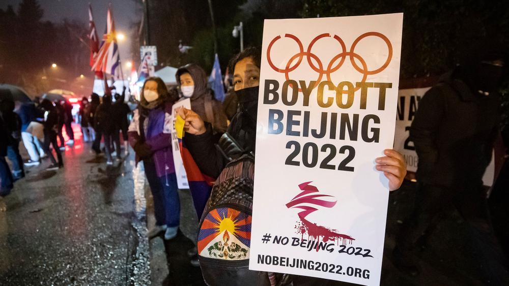 Protesters oppose the Beijing Winter Olympics due to China&#039;s human rights abuses, Feb. 3, 2022, outside the Chinese Consulate, in Vancouver, British Columbia. (Darryl Dyck/The Canadian Press via AP)
