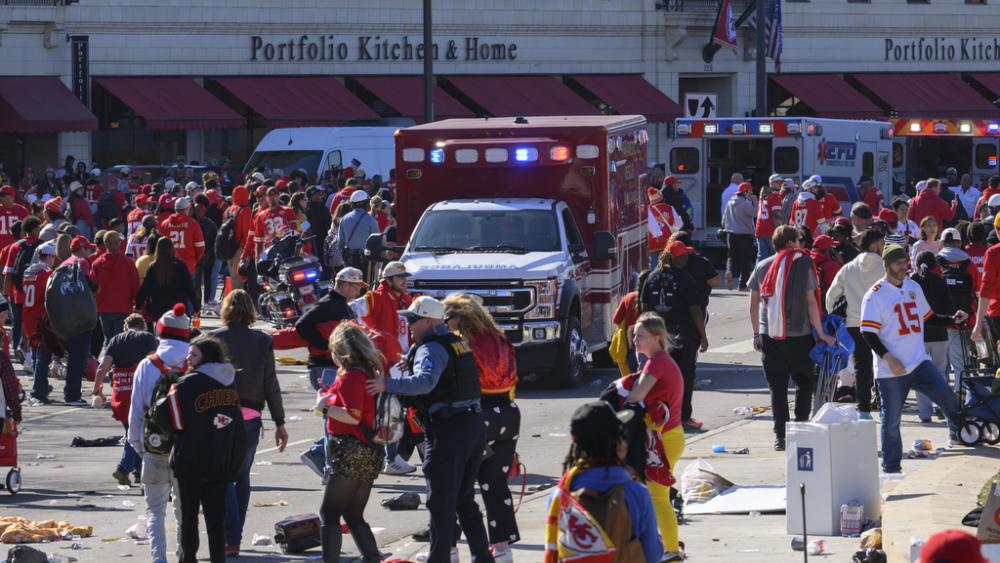 Police clear the area following a shooting at the Kansas City Chiefs NFL football Super Bowl celebration in Kansas City, Mo., Wednesday, Feb. 14, 2024. Multiple people were injured.(AP Photo/Reed Hoffmann)