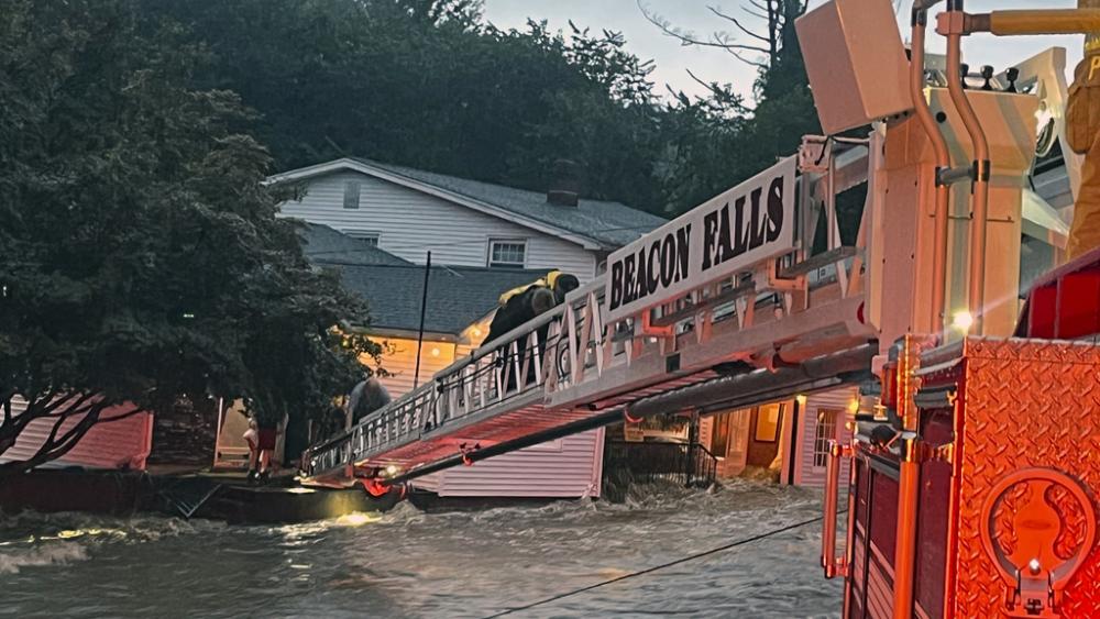 Beacon Hose Co. No. 1, a fire station in Beacon Falls, Connecticut, rescues people from the Brookside Inn in Oxford, Conn., Aug. 18, 2024. (Beacon Hose Co via AP)