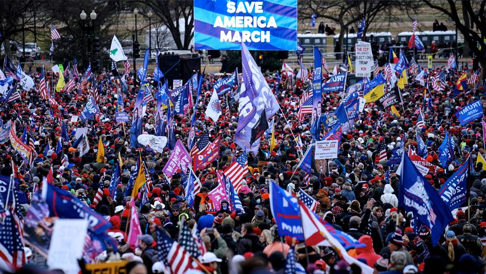 Trump supporters gather on the Washington Monument grounds in advance of a rally Wednesday, Jan. 6, 2021, in Washington. (AP Photo/John Minchillo)