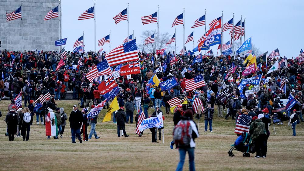 Trump supporters gather on the Washington Monument grounds in advance of a rally Wednesday, Jan. 6, in Washington. (AP Photo/Julio Cortez)