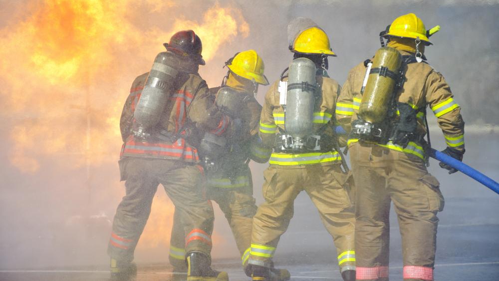 firefighters (Adobe stock photo)