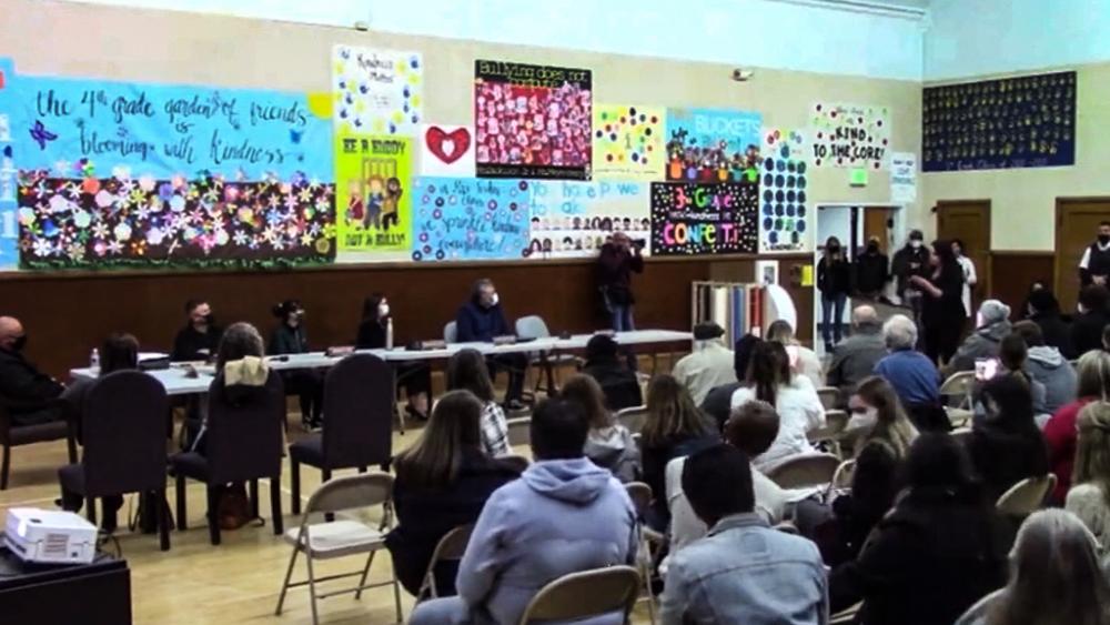 Parents protest at a harrisonburg school board meeting