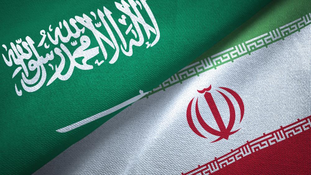 Iran and Saudi Arabian flags (Adobe stock)