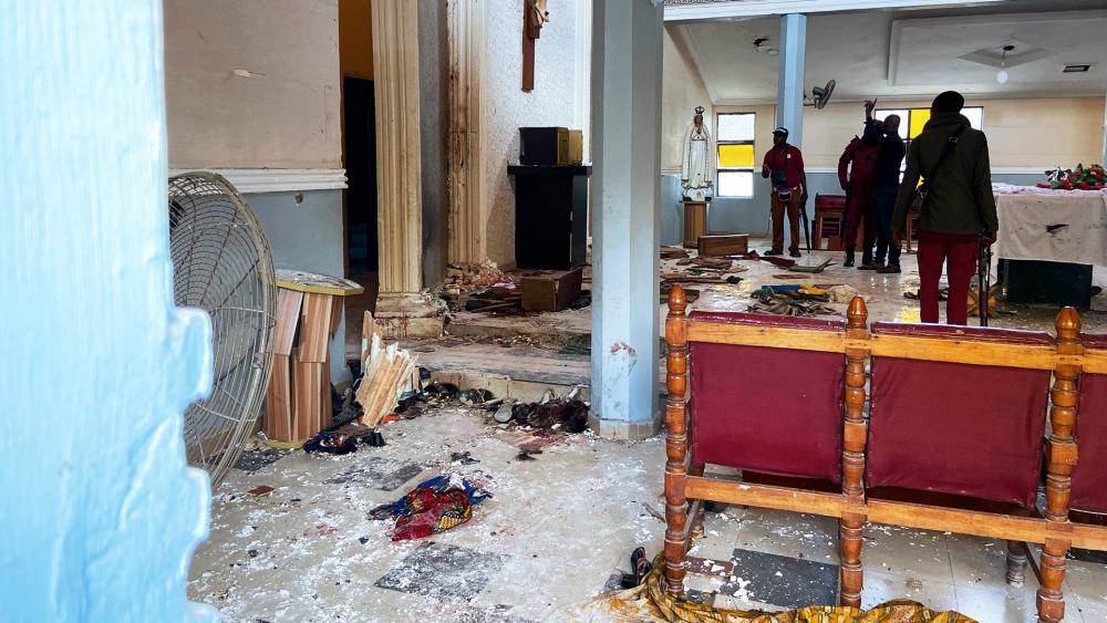 Gunmen opened fire and detonated explosives at St Francis Catholic Church in Owo Nigeria, Sunday, June 5, 2022  (AP Photo/Rahaman A Yusuf)