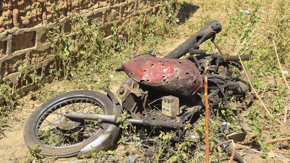 FILE: The remains of a motorcycle after an attack in Nigeria, Dec. 5, 2023.  (AP Photo Kehinde Gbenga)