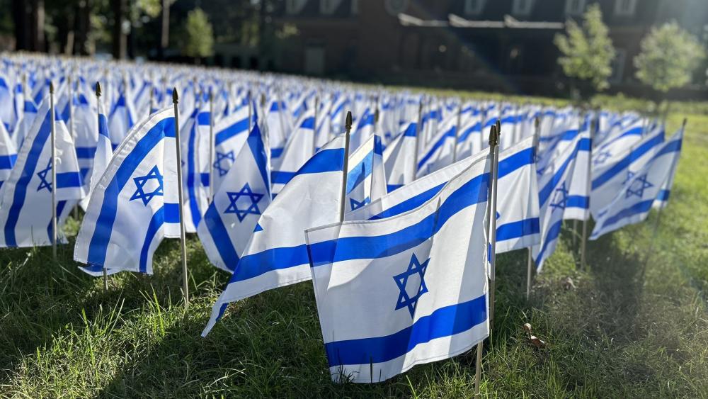 Regent University students placed Israeli flags on campus as a memorial for the lives lost during the events of October 7 one year ago. (Photo Courtesy: Regent University)