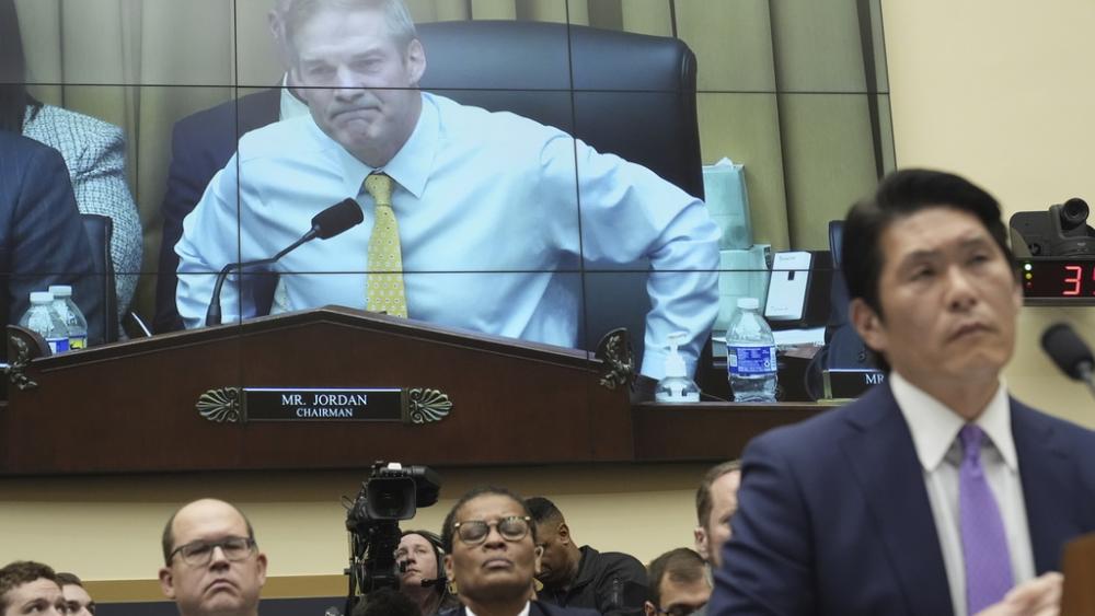 PHOTO: Department of Justice Special Counsel Robert Hur, right, testifies on Capitol Hill, March 12, 2024. House Judiciary Committee Chair Rep. Jim Jordan, R-Ohio, is shown on the rear screen. (AP Photo/Jacquelyn Martin)
