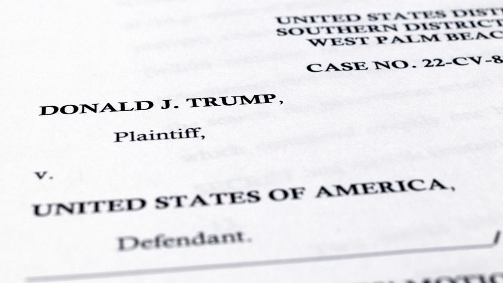 A page from the Justice Department&#039;s motion to appeal a judge&#039;s decision to name an independent arbiter to review records seized by the FBI during a search of his Mar-a-Lago estate is photographed Thursday, Sept. 8, 2022. (AP Photo/Jon Elswick)