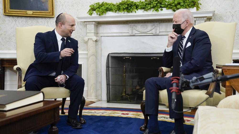 Israeli Prime Minister Naftali Bennett speaks as he meets with President Joe Biden in the Oval Office of the White House, Friday, Aug. 27, 2021, in Washington. (AP Photo/Evan Vucci)