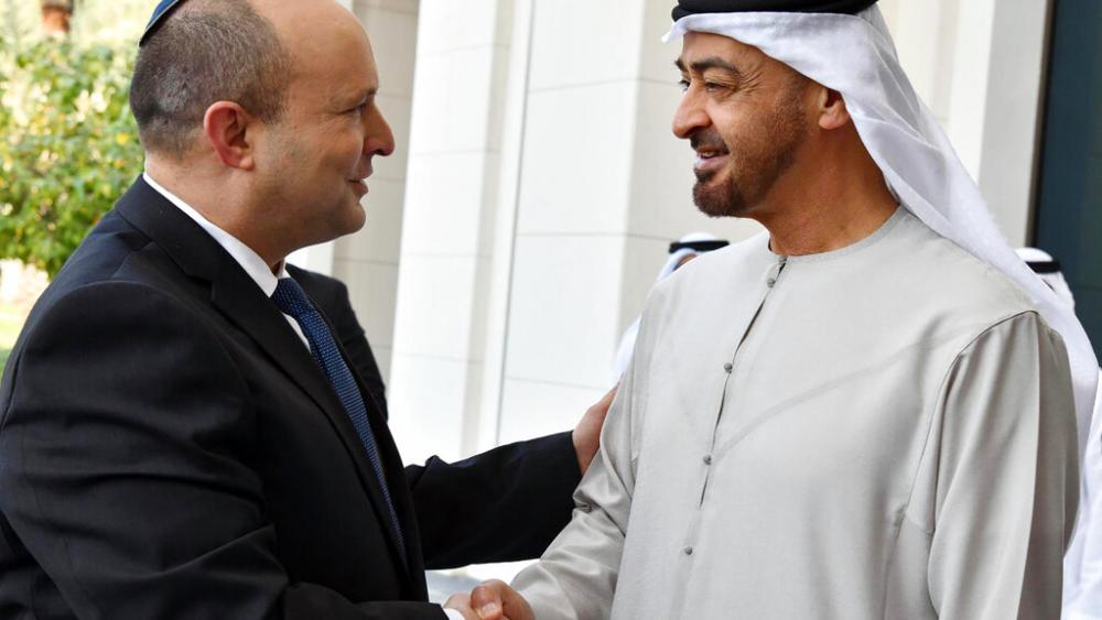 Israeli Prime Minister Naftali Bennett, left, shakes hands with Sheikh Mohammed bin Zayed Al Nahyan, the crown prince of Abu Dhabi and de facto ruler of the United Arab Emirates. (Haim Zach/Israel Government Press Office via AP)
